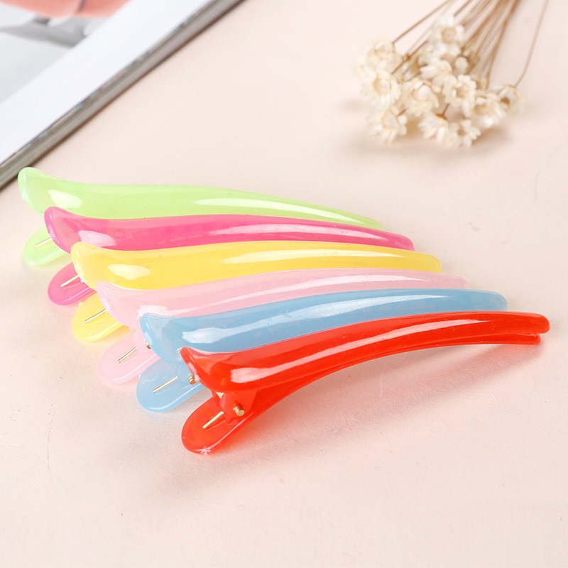 Kẹp tóc mỏ vịt bằng nhựa trơn bóng đẹp.