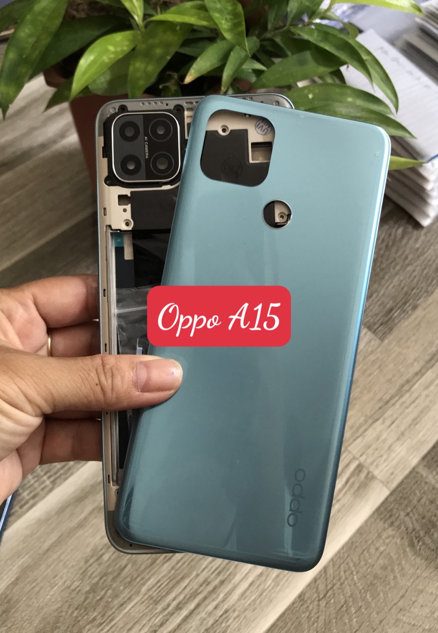 Bộ vỏ oppo A15 / A15s zin  (gồm lưng ,xương ,phím bấm,kính camera )