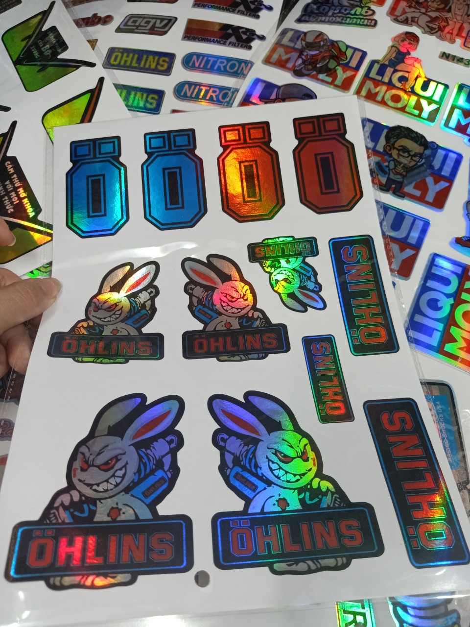 Tem Dán Xe Máy Logo Crom Con Thỏ Cầm Phuộc