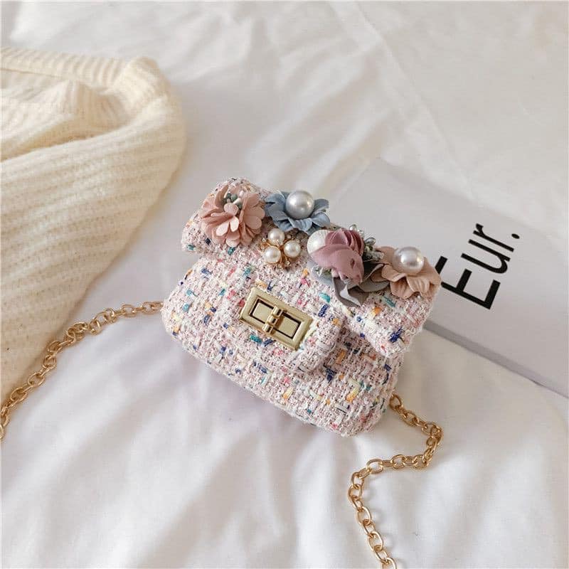 Túi dạ mini đính hoa đeo chéo cho bé