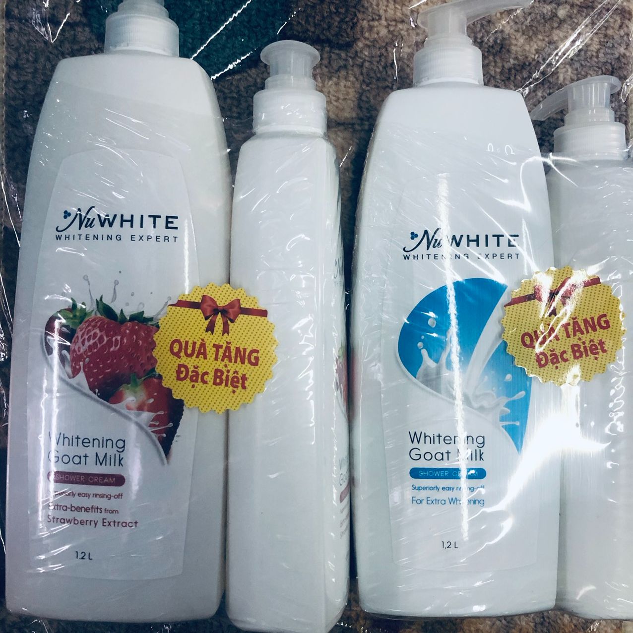 Sữa tắm trắng da NuWhite tinh chất 1.2 lít ( cty hết hàng tặng )