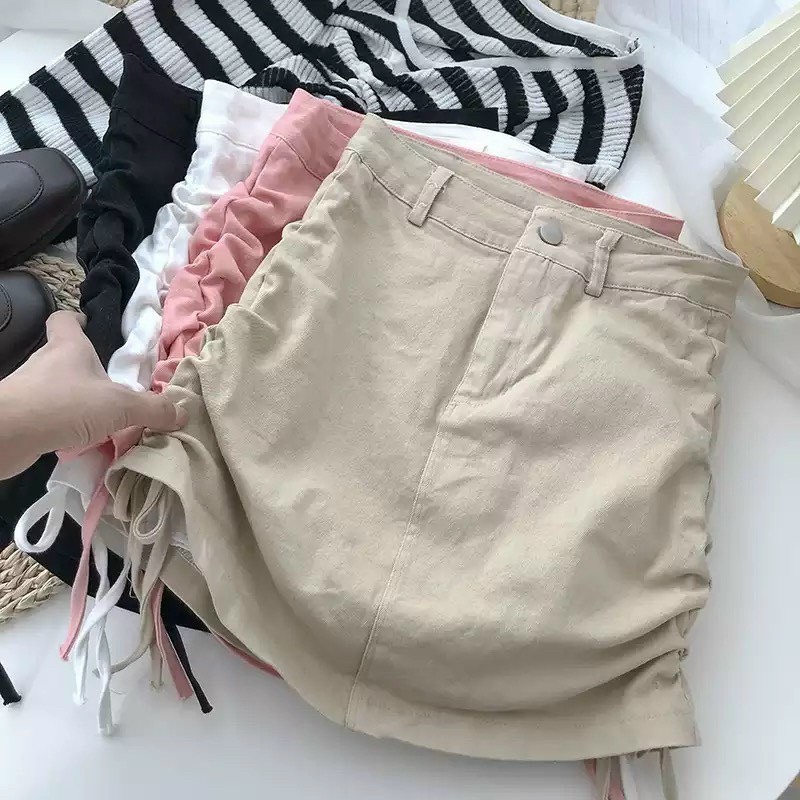 Chân váy kaki lưng cao dây rút hai bên may kèm quần