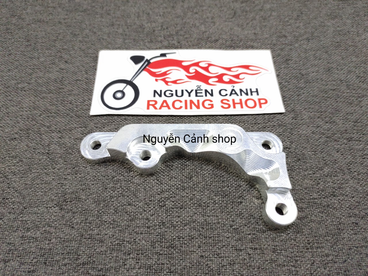 pas đĩa heo nissin raider satria 150