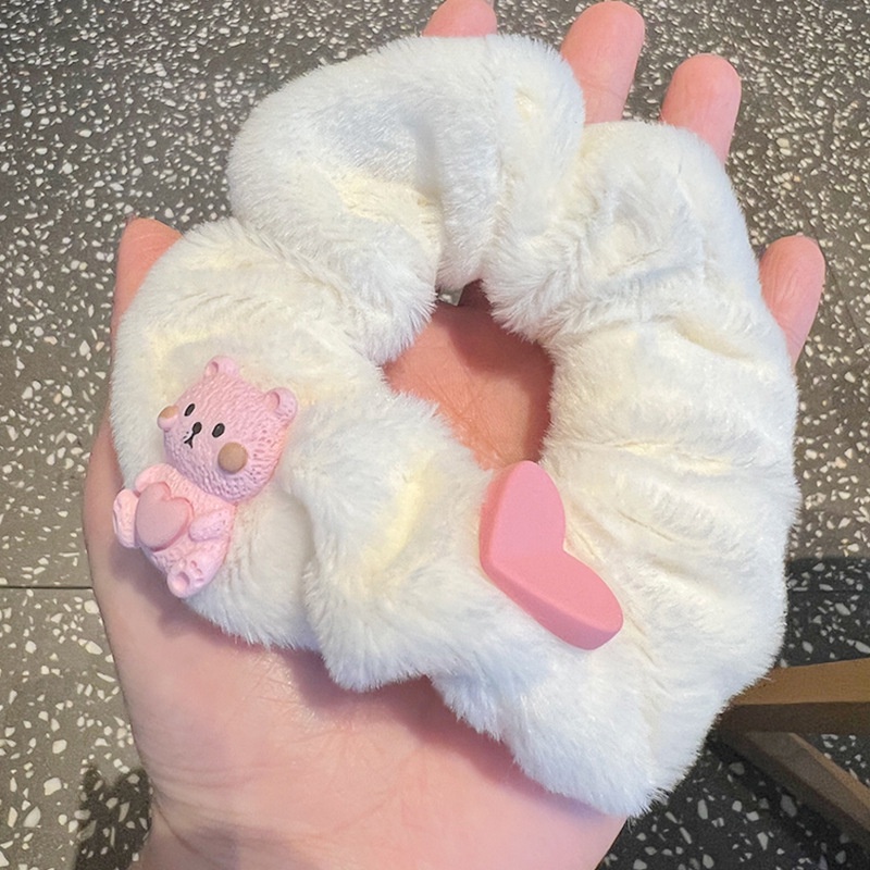 Cột tóc lông gấu hồng cute