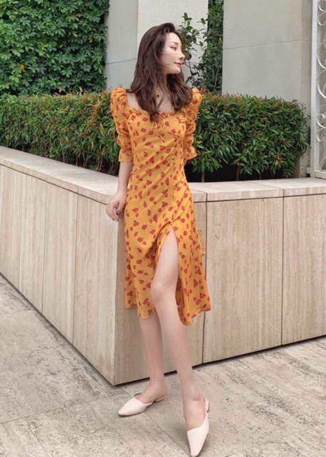 Đầm hoa vàng xẻ tà form dài
