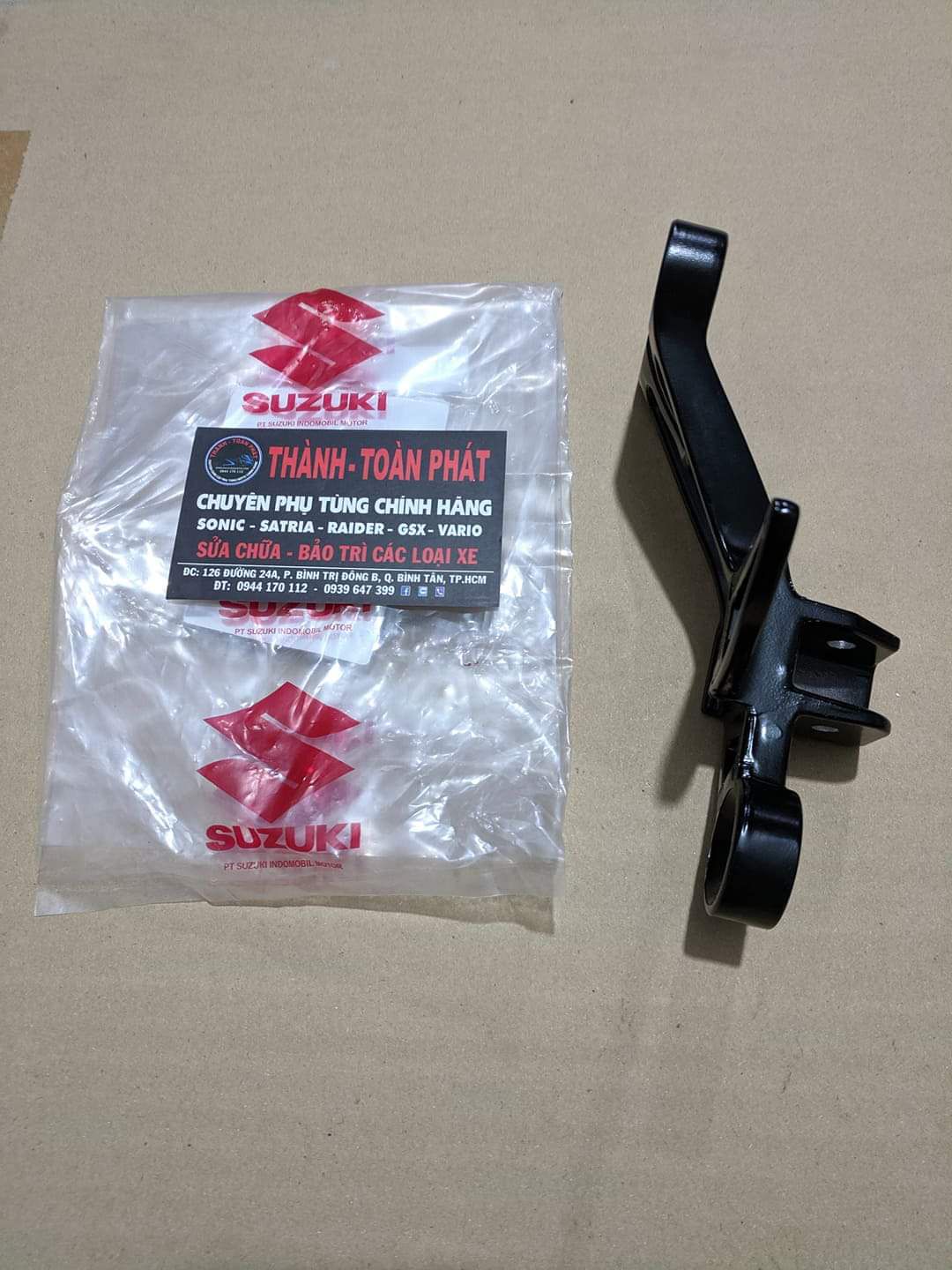 Pát gát chân sau Satria Fi,Raider( bên phải)