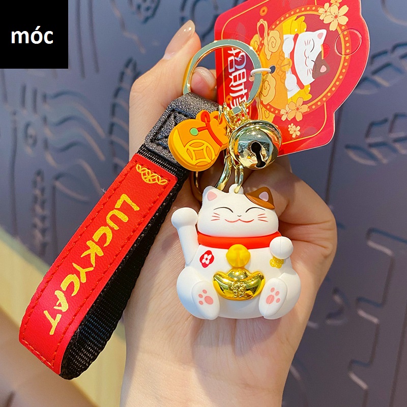 Móc khóa Mèo thần tài ôm vàng bạc