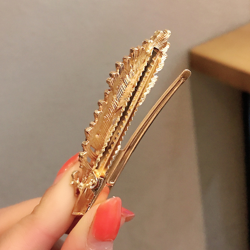 [Hot&Hiếm] 1 kẹp tóc nữ lông vũ đính đá siêu xinh lấp lánh