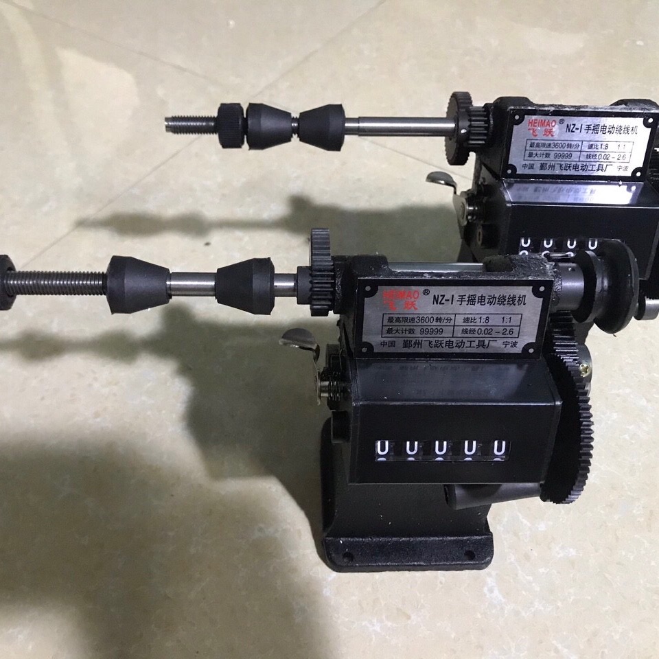 máy quấn dây báo số tự động.