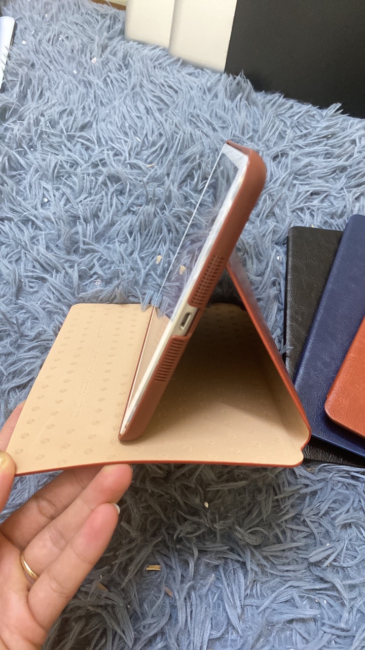 bao da KaKu cho ipad mini 1, mini 2 và mini 3 tích hợp chân đế, từ tính tắt mở cảm ứng máy giá rẻ BH 12 tháng