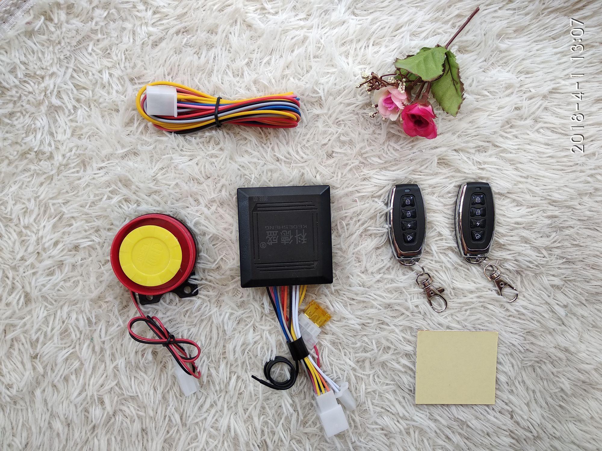 Khóa chống trộm xe máy 4 nút 2 remote viền thép nhỏ gọn TA-11