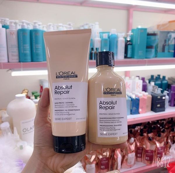 Loreal absolute repair gold quenoa shampoo for damaged hair--300ml- construction 200ml