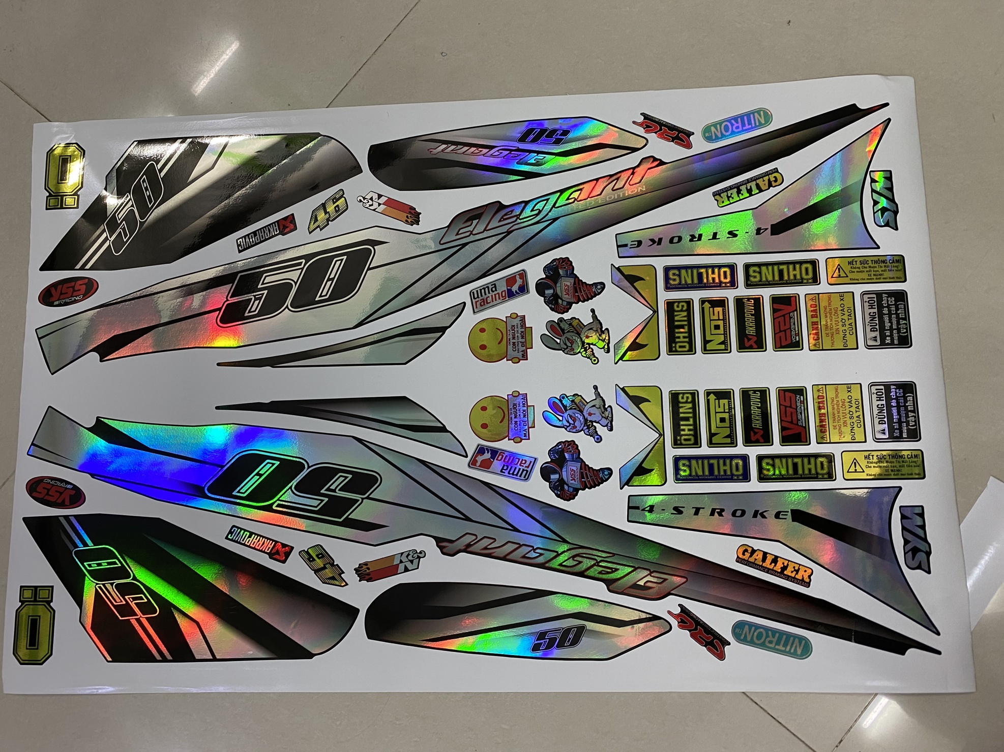 Tem xe ELEGANT CHẾ TRẮNG ĐEN CROM TITAN 7 MÀU