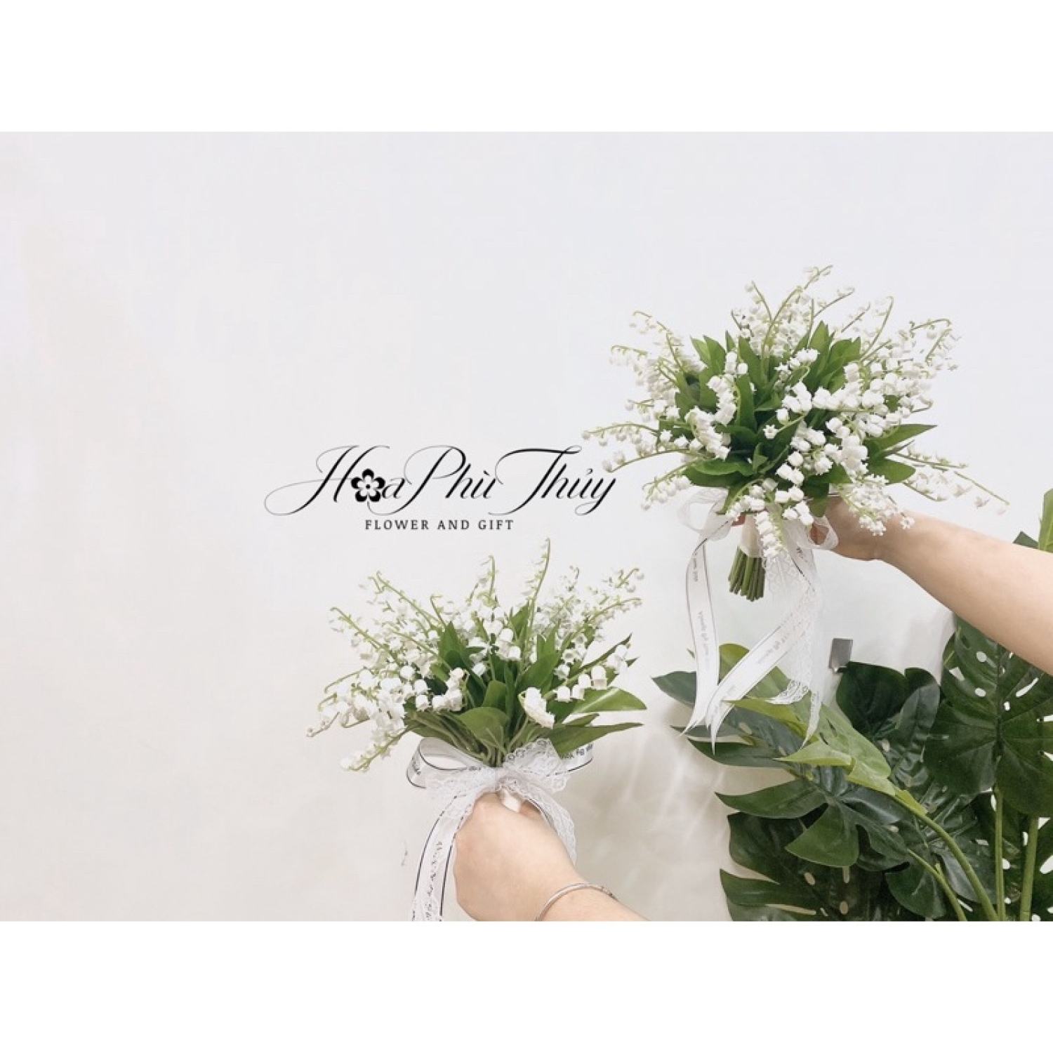 Bó hoa cưới cầm tay cô dâu linh lan
