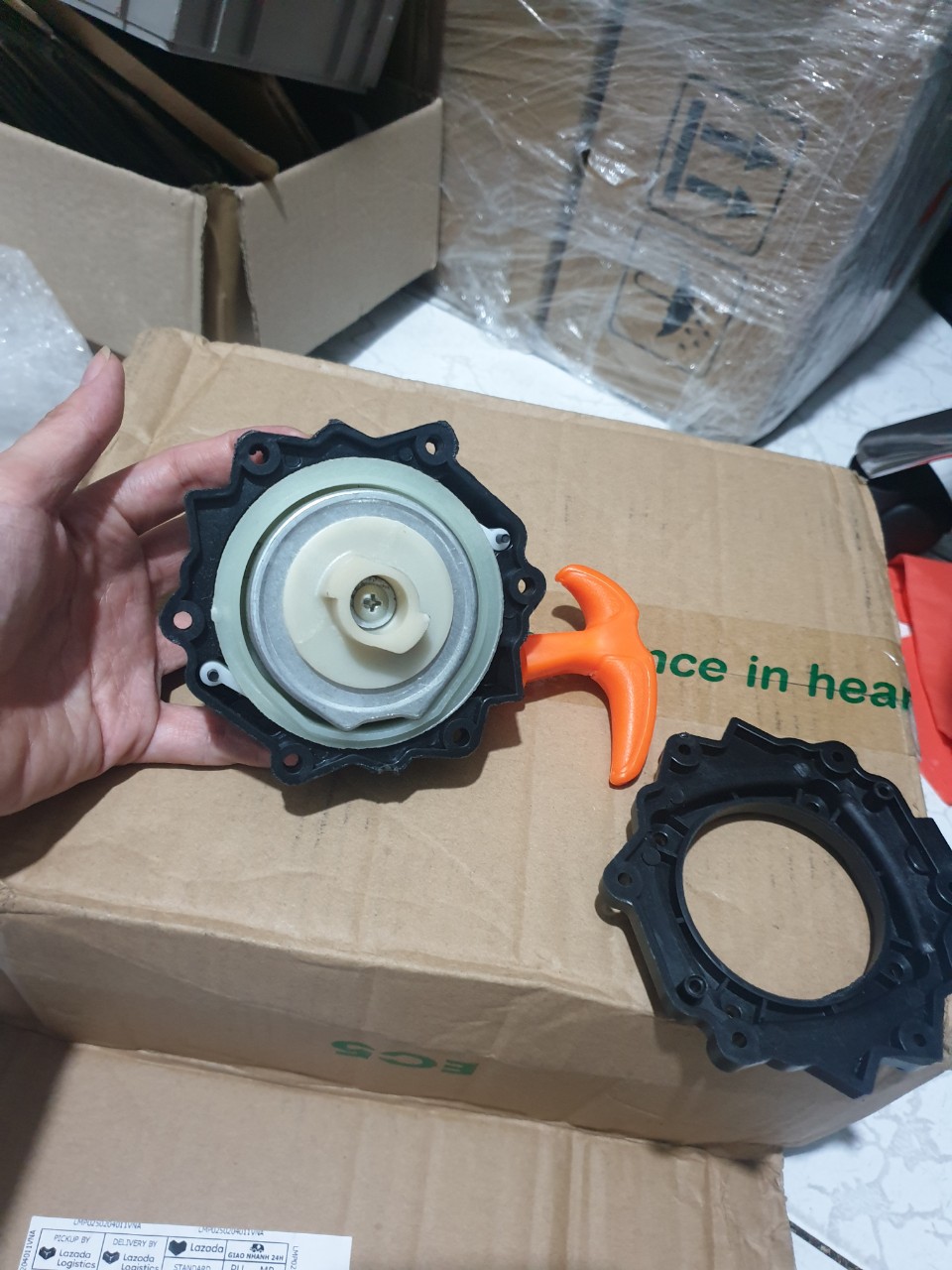 Bộ chụp giật ( khởi động) máy cắt cỏ 260 trợ lực ( 4 ốc - 2 chấu)