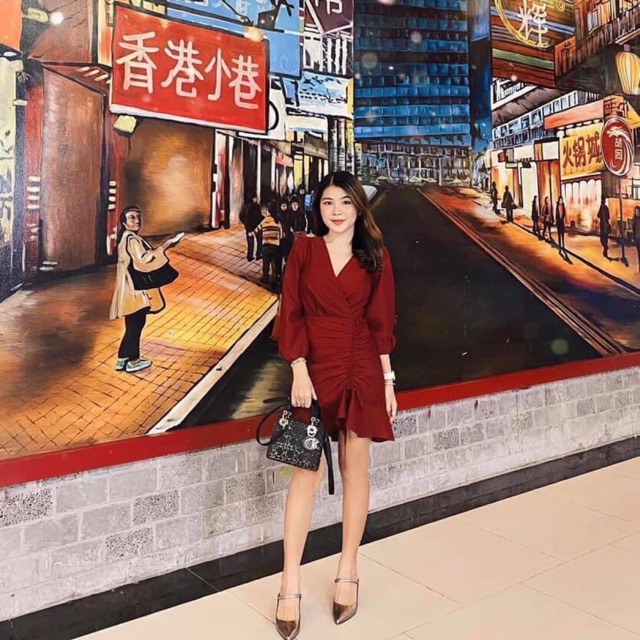 Đầm vạt chéo đuôi loe rút dây DUTIEC45
