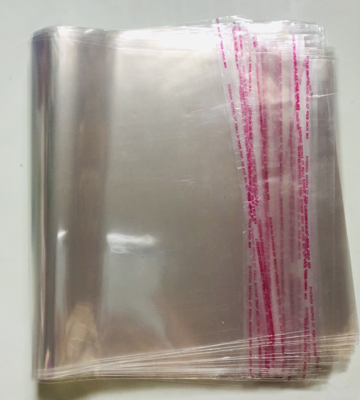 {1kg/size}- túi opp dán miệng, đựng quần áo, bao lì xì