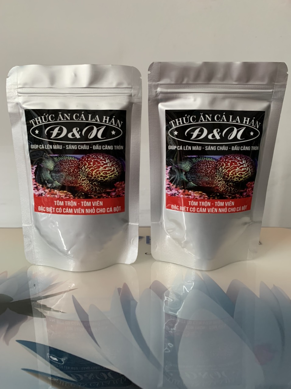 Thức ăn cá la hán - cám la hán đ&n 100gr (hạt Lớn)