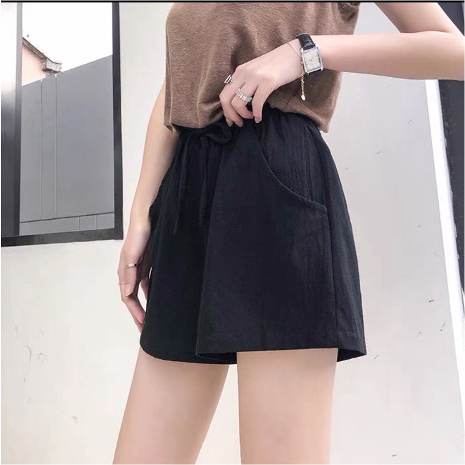 Quần đùi đũi cạp chun ống rộng thắt nơ