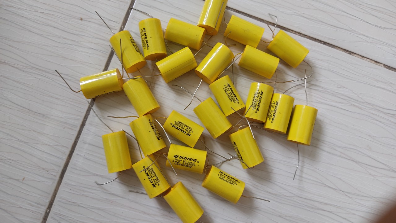 tụ phân tần vàng tròn 6.8 MF - 250v - tụ loa trung loa mid