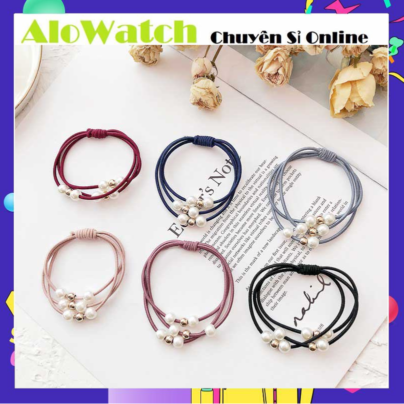 Thun cột tóc đính hạt sang trọng