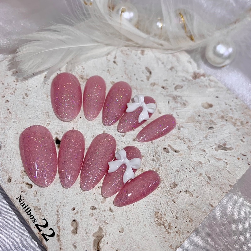 Nailbox - Mẫu nailbox siêu xinh thạch nhũ flash cầu vồng đính charm nơ trắng