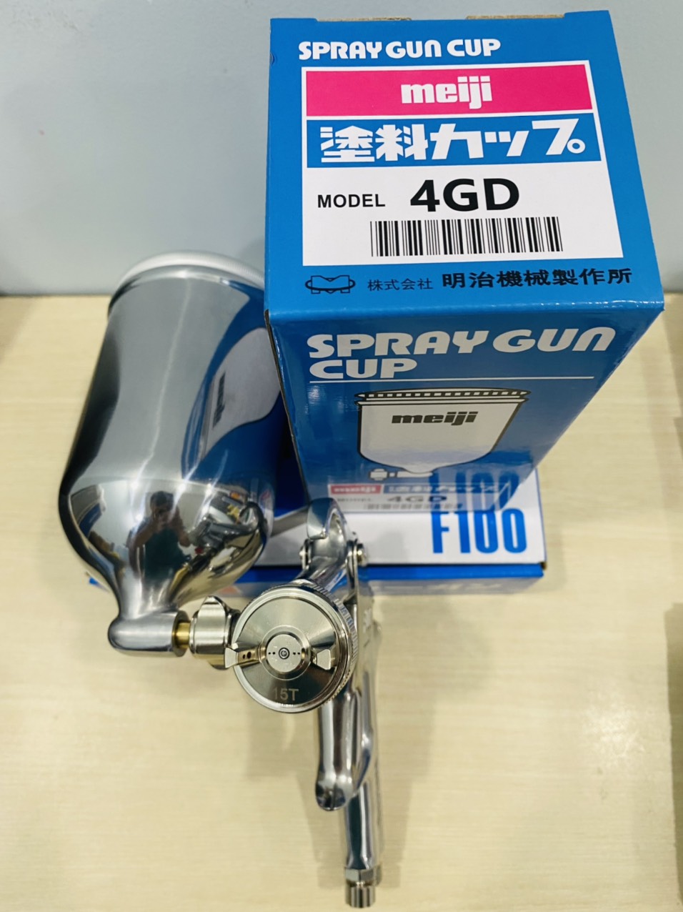 Súng phun sơn Nhật Bản Meiji F100 (Kim béc 1.3mm và 1.5mm, đã gồm cốc đựng sơn 400ml 4GD)