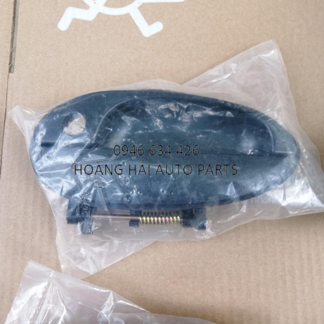 Tay mở cửa ngoài daewoo matiz 2, cửa sau bên phụ, bên lơ