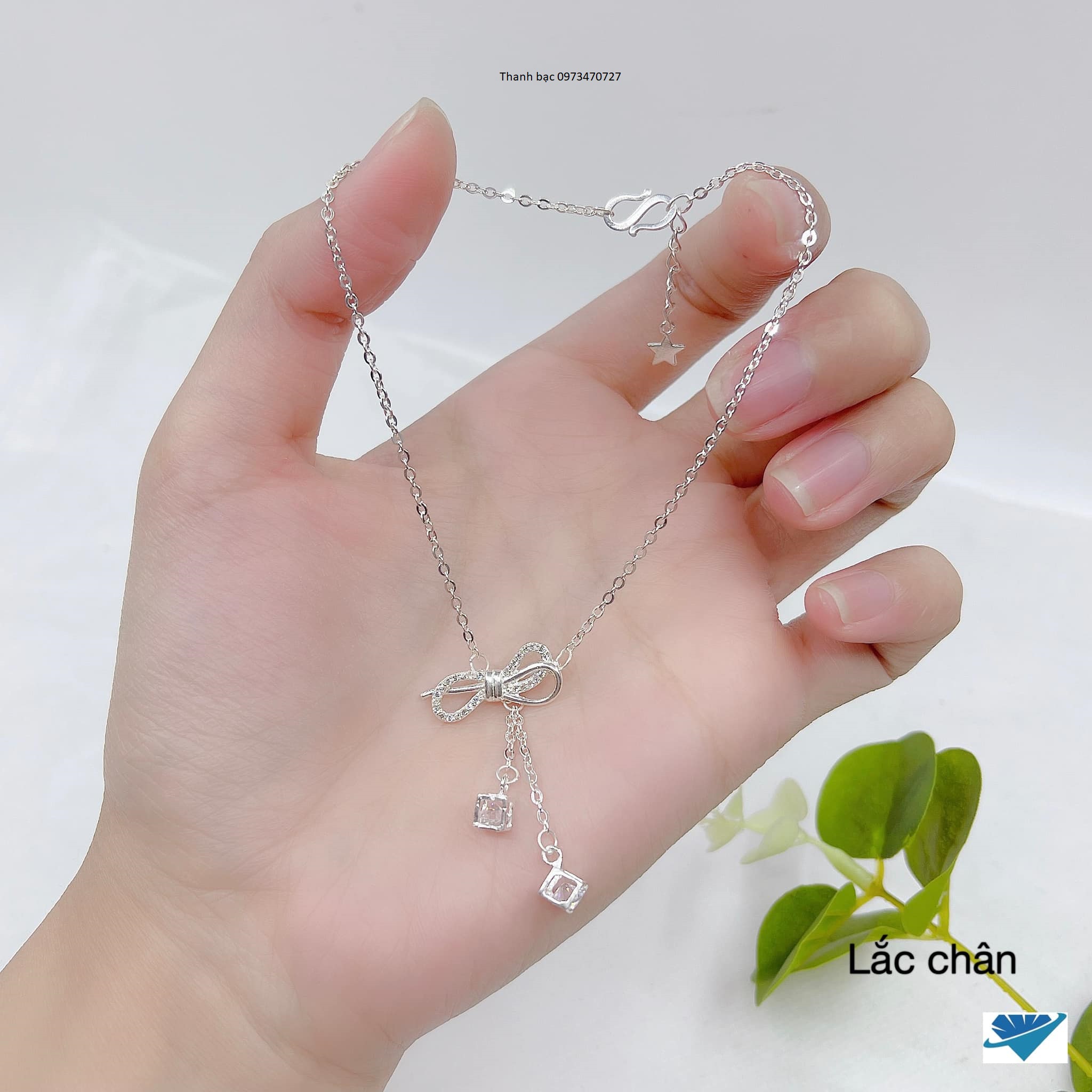 Lắc chân tinh tế nhẹ nhàng, bạc ta cho nữ kết hợp nơ