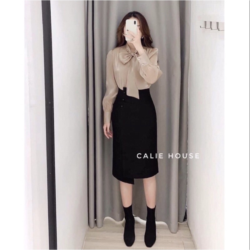 Chân váy công sở cách điệu phối cúc bọc vạt lệch chân váy xẻ tà dập ly lưng cao dáng bút chì