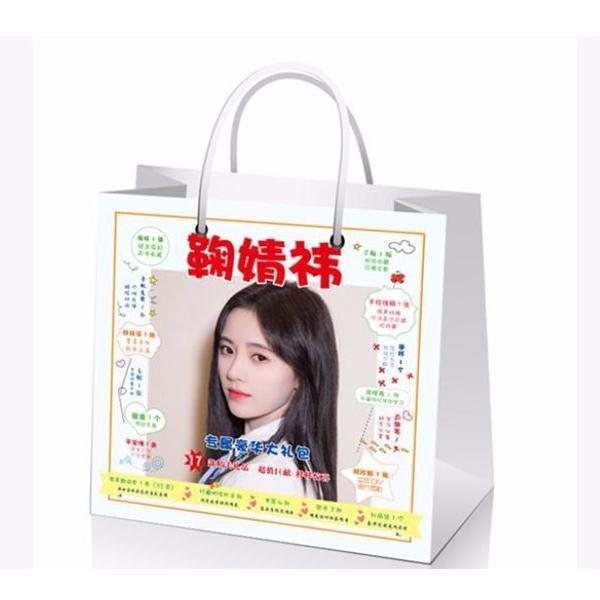 Túi quà Cúc Tịnh Y 17 món có poster postcard bookmark banner huy hiệu thiếp ảnh dán album ảnh