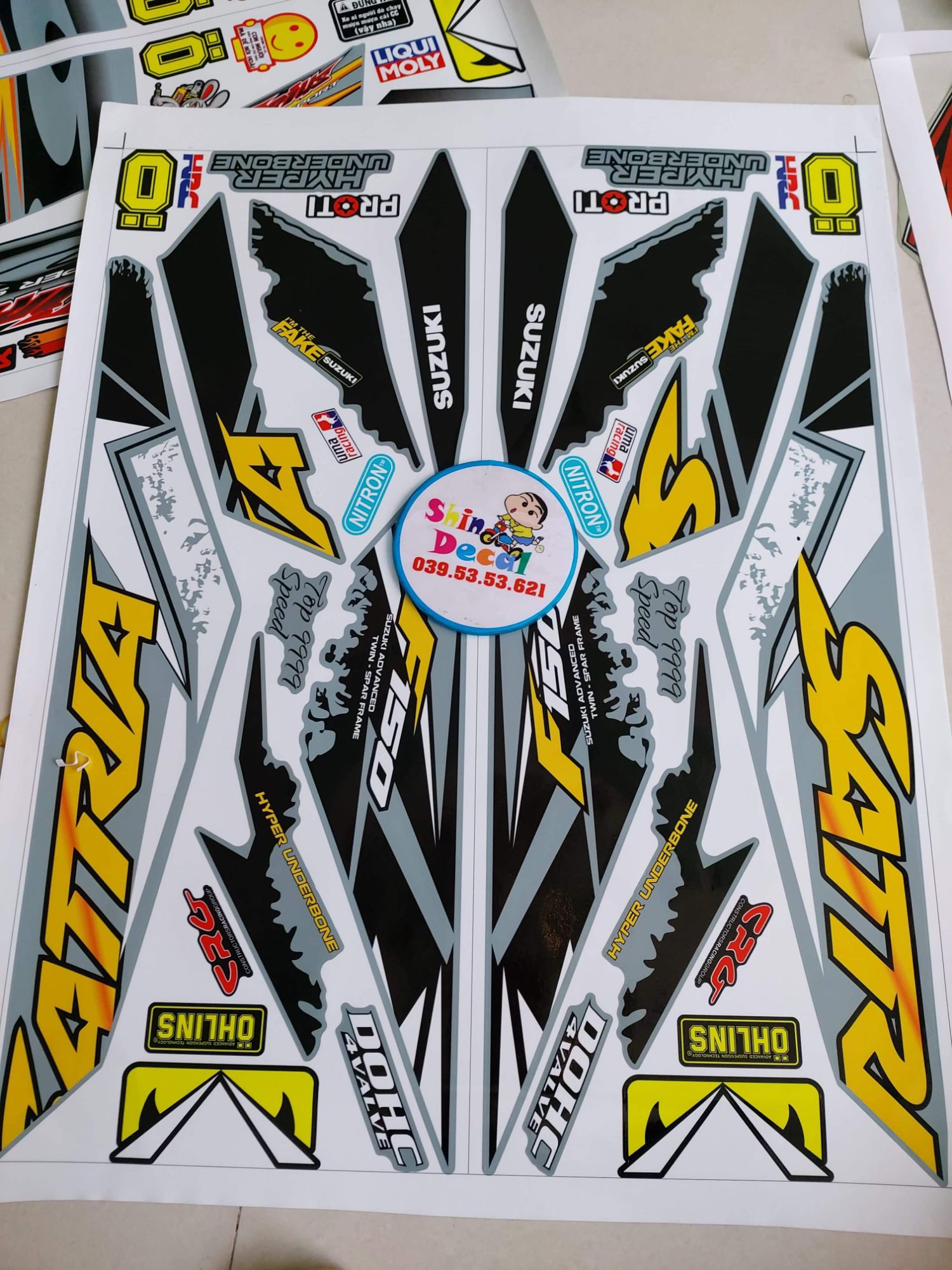 Tem xe satria fi xám đen