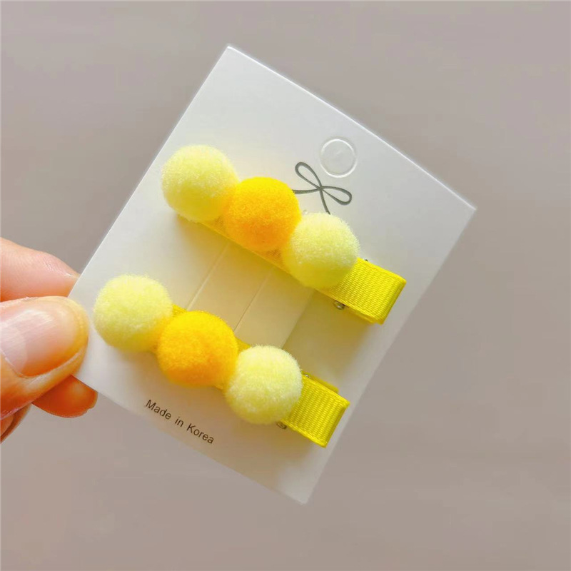 set 2 kẹp tóc pon pon cho bé .