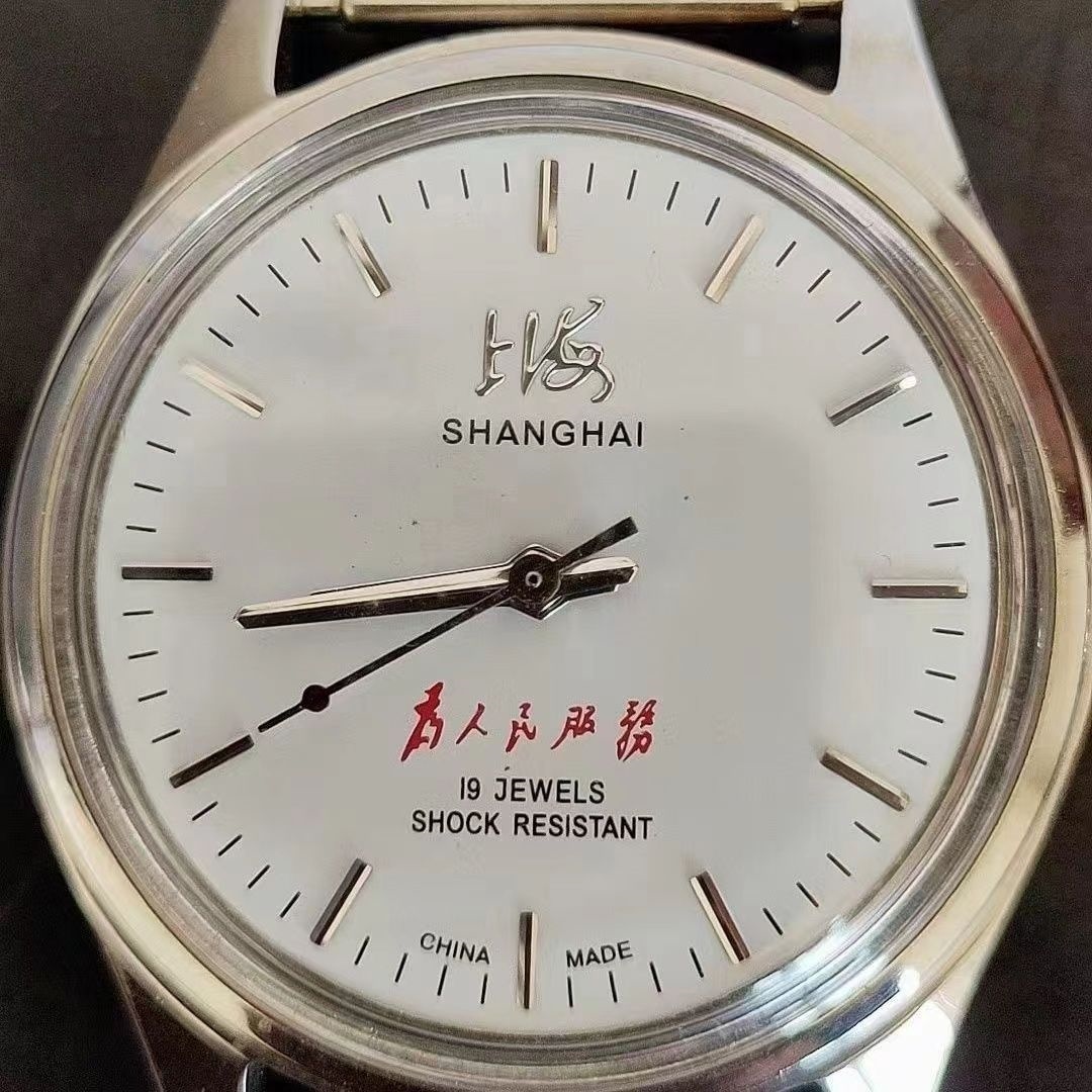 Cũ xác thực đồng hồ Thượng Hải cũ đồng hồ cơ chống thấm nước cổ điển retro hoài cổ kỷ niệm quanh co nam đồng hồ đeo tay