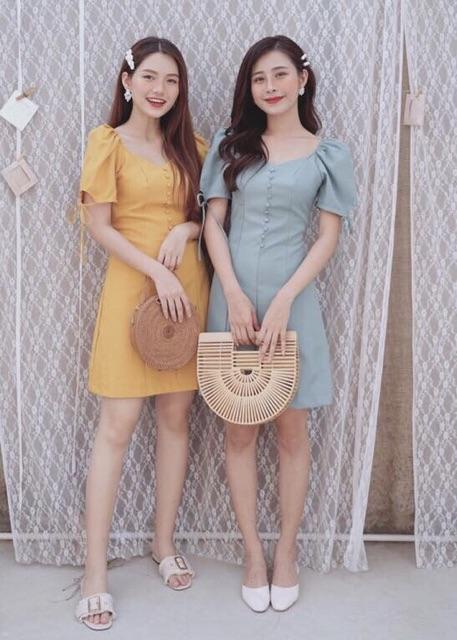 Đầm nút bọc tay nơ 2 màu (kèm hình thật)