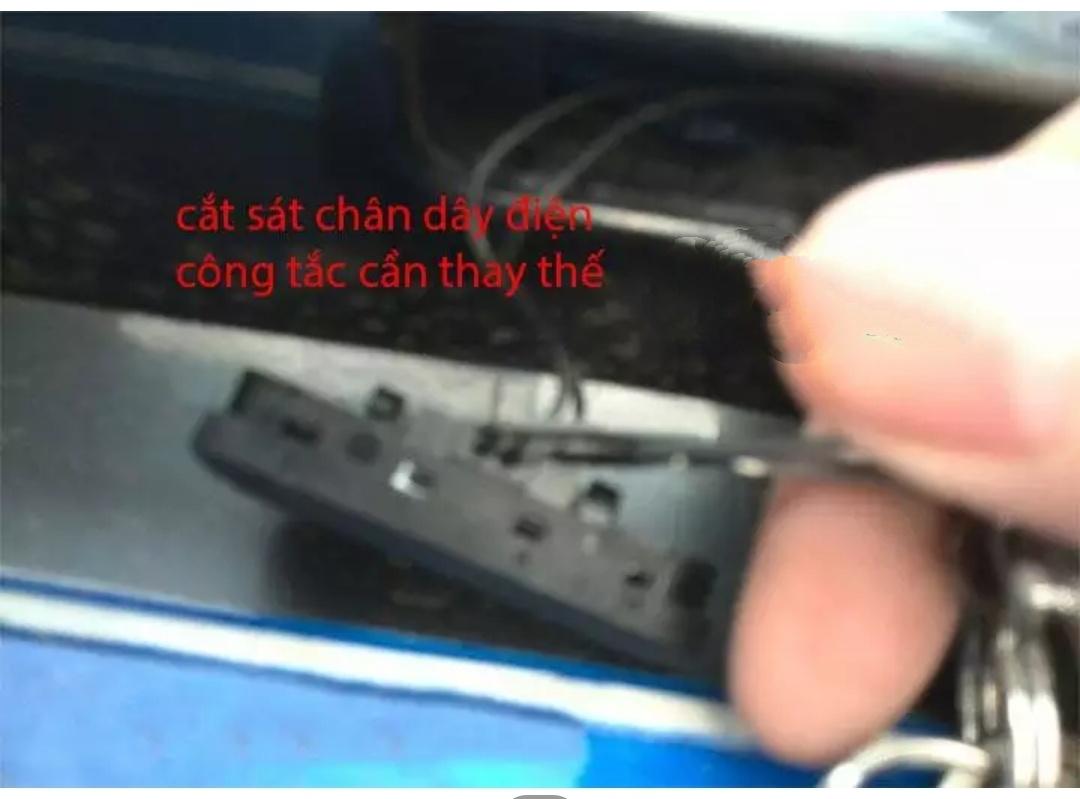 Nút mở cốp cruze- Lacetti