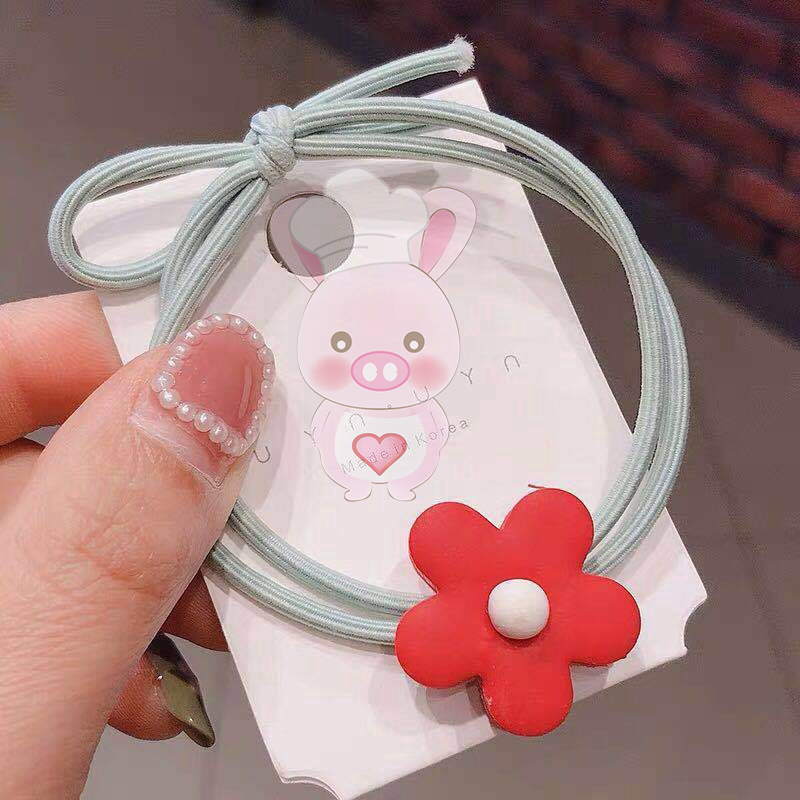 Cột tóc hình hoa mai cute cho bạn và bé