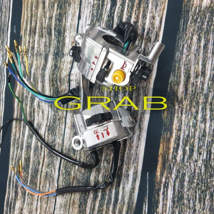 Bộ cùm công tắc xe CUB 82 (2 bên) - không đề
