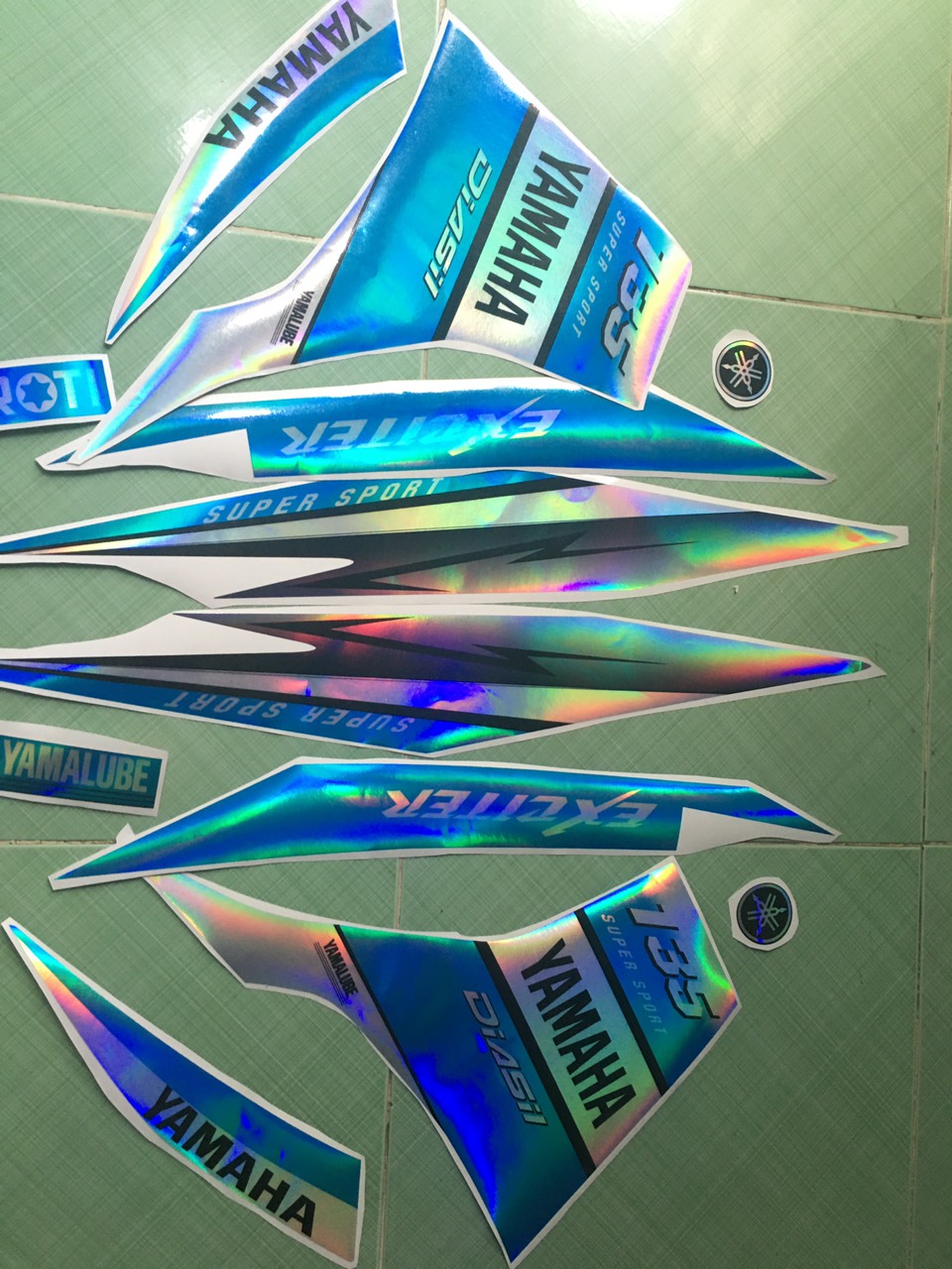 Tem exciter 135 xanh ngọc bạc crom