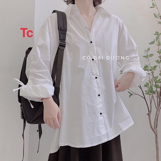 Áo sơ mi nữ dáng rộng cúc giữa lệch tà siêu xinh