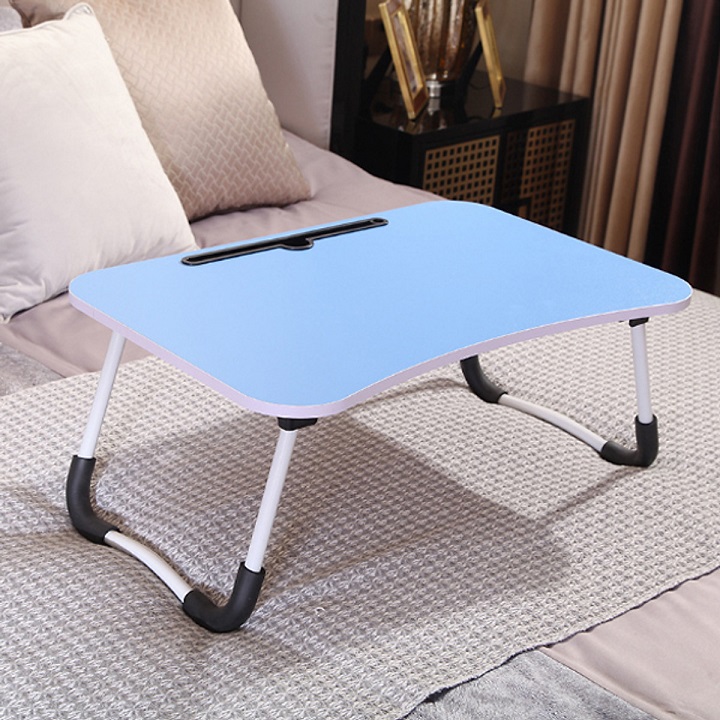 Folding study table compact has slot for iPad