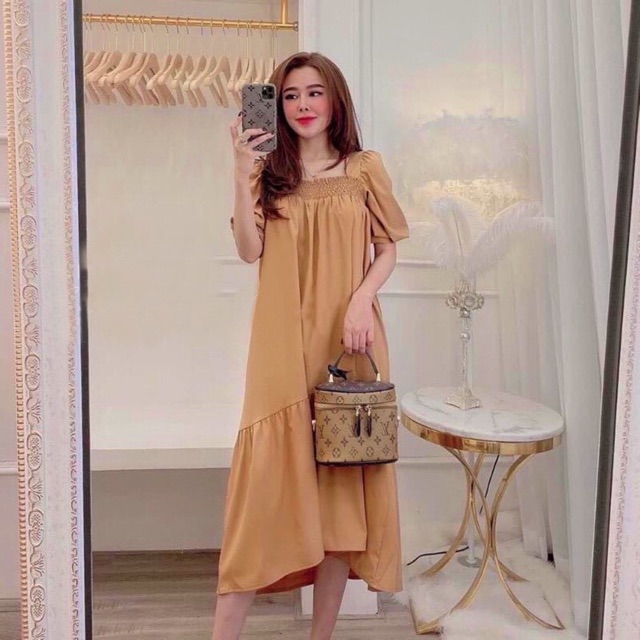Đầm kem đuôi cá nhúng thun ngực