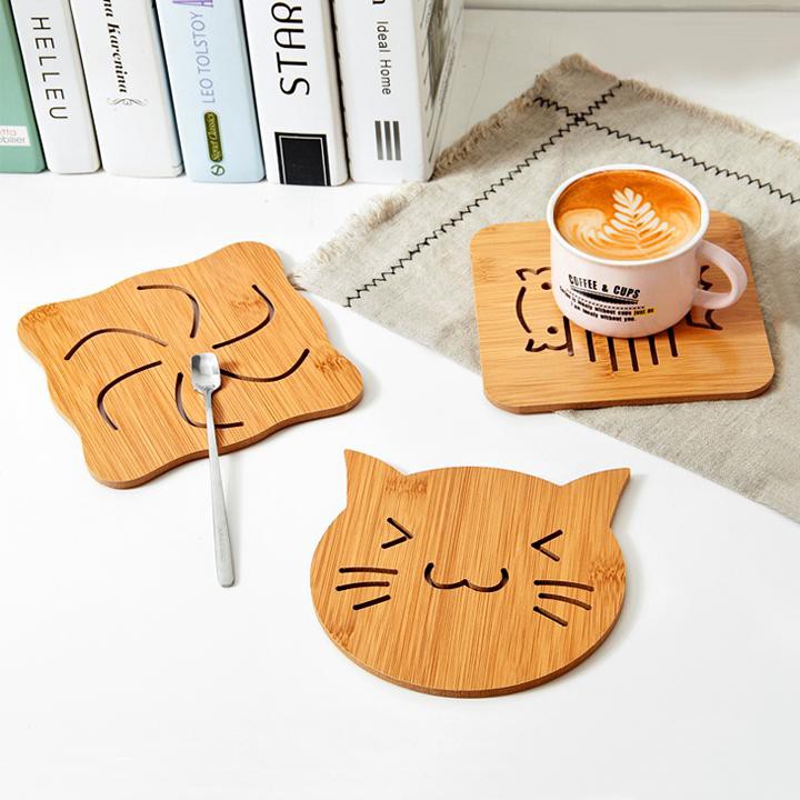 Combo 4 miếng lót ly bằng gỗ nhiều hình.