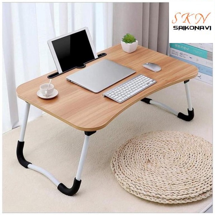 Folding study table compact has slot for iPad