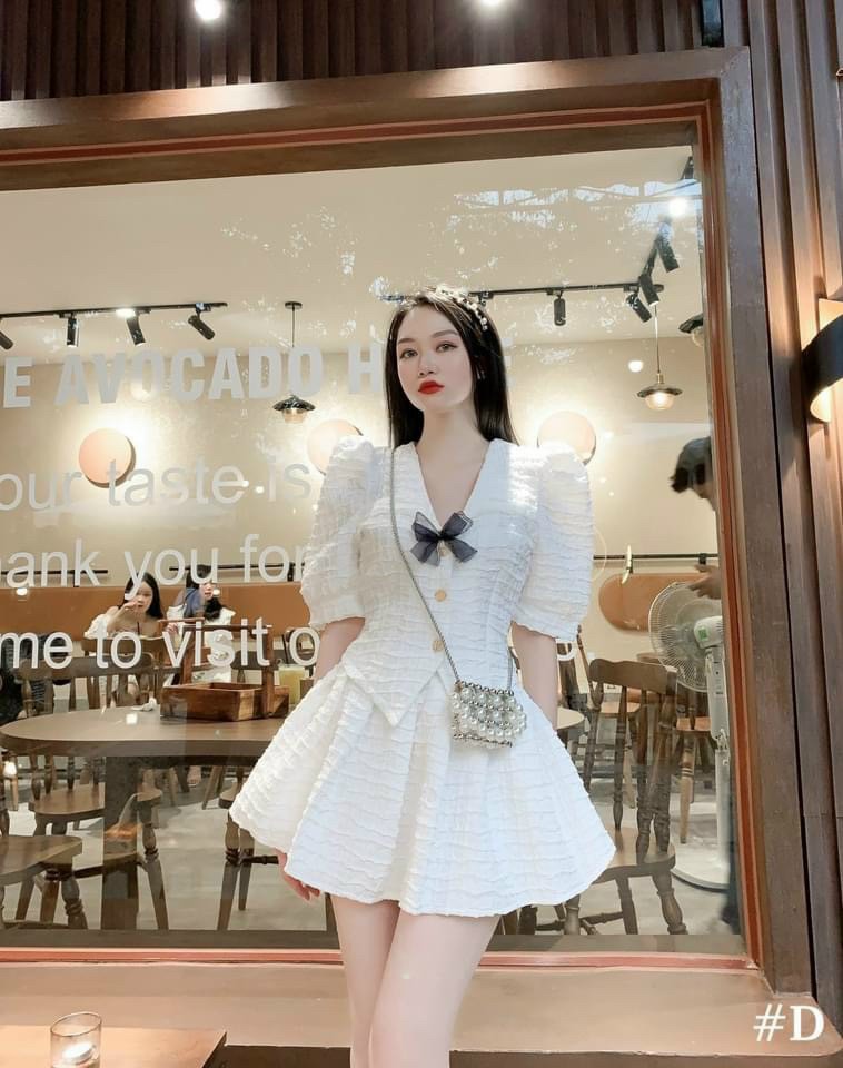Set áo kèm chân váy - chất gấm - thiết kế cột nơ , tay phồng trẻ trung