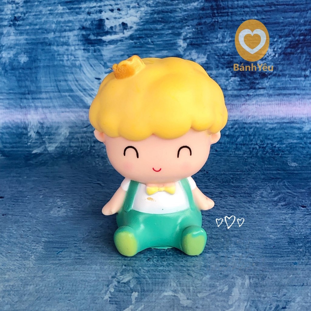 Cậu bé khủng long trang trí bánh kem