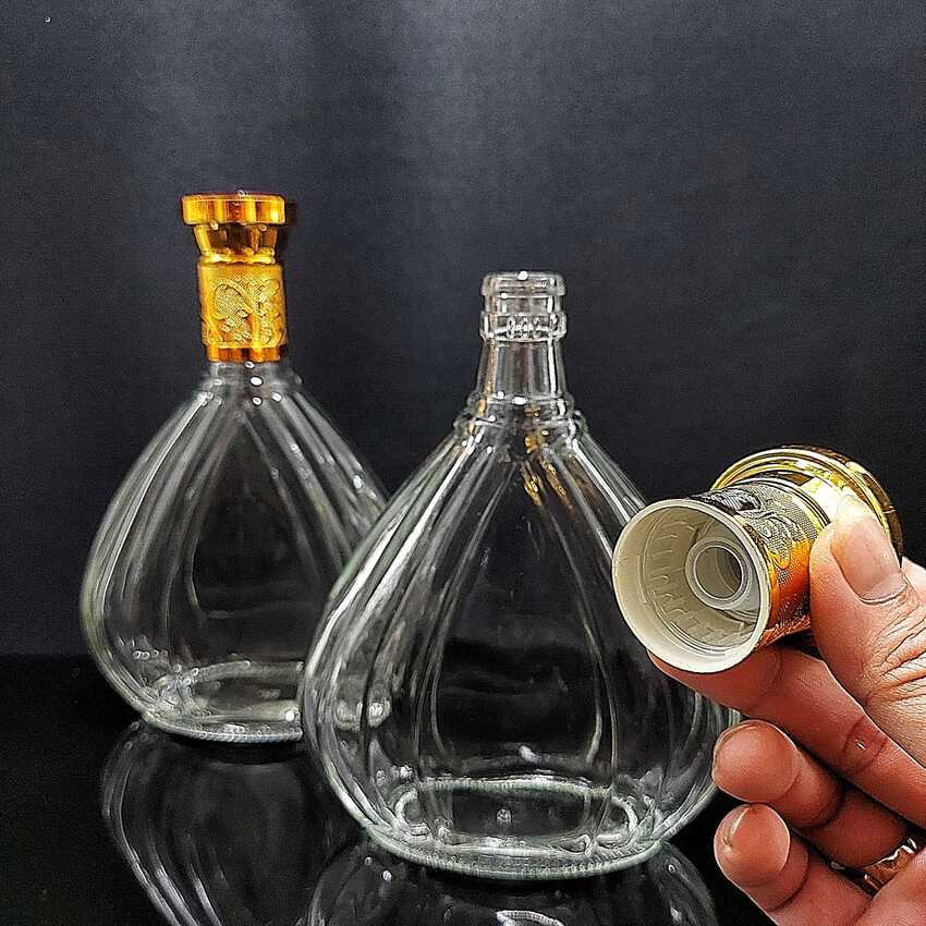 Chai Đựng Rượu 500ML mẫu giọt nước dẹt - hoa văn cánh sen nắp vàng chuôi đỏ - Vỏ Chai Rượu Đẹp - Chai Thủy Tinh Đựng Rượu - Bình Đựng Rượu 500ML (C5)