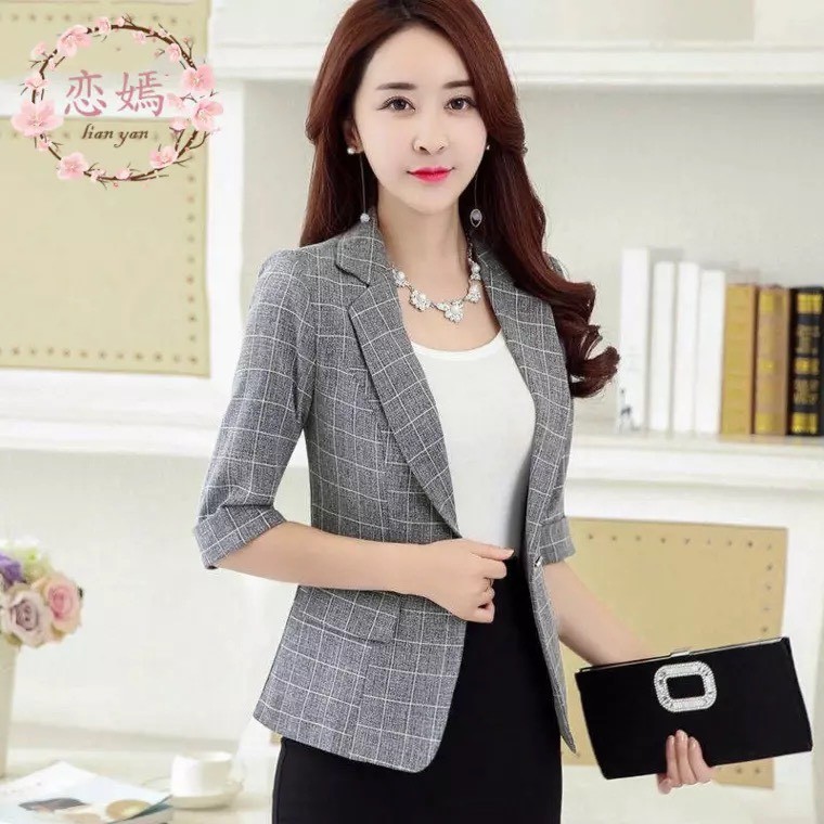 áo vest kẻ tay lỡ phong cách cho nữ