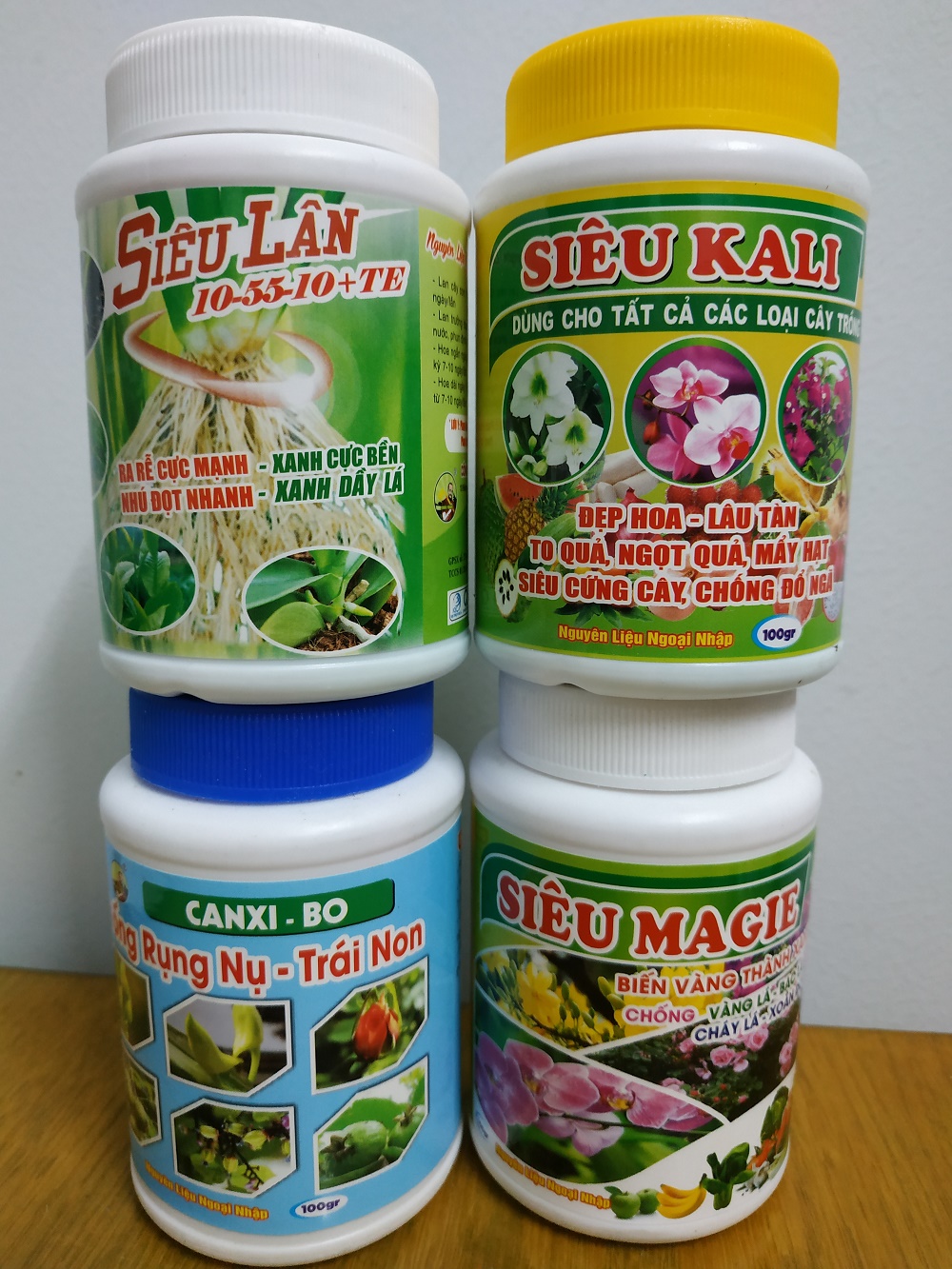 Bộ tứ sản phẩm dưỡng cây, kích hoa ( Canxi-bo + Kali + Magie + lân ) 100 gram/chai-BIOMAX