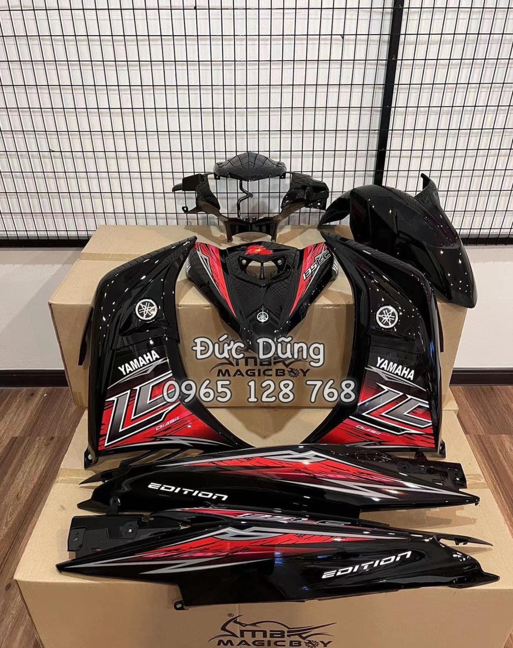Dàn áo Ex 135 đen tem LC đỏ